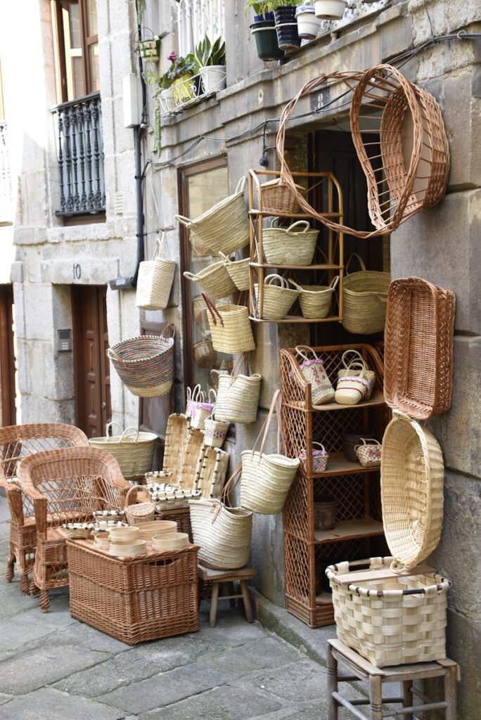 wicker baskets and baskets on display outside a building